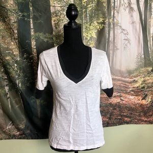 White and black v neck t shirt size small
